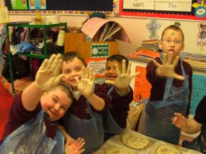 Hand Print Project in process. Large-scale Collaborative Public Art Commission 2009 with St. Peter’s National School, Phibsborough, Dublin. This project celebrated the opening of their new school building and had a strong collaborative element between Ceramic Artist Michelle Maher and the whole school community. We took the handprints in clay and slip of all pupils, teachers and staff and created a series of three large-scale ceramic wall murals. www.ceramicforms.com